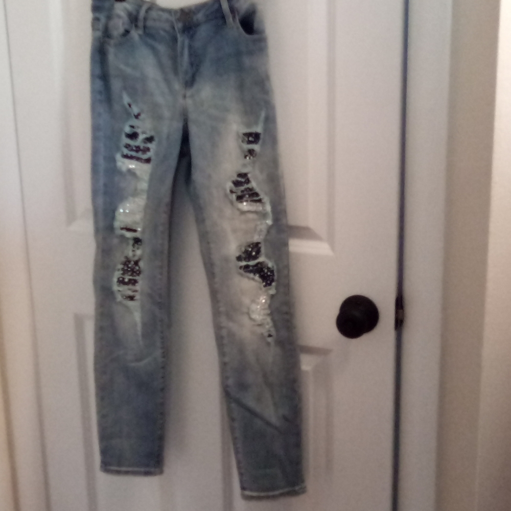 NWOT Bebe rhinestoned out and distressed jeans! 31